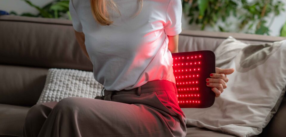 woman-using-red-light-therapy-on-her-back-2026-03-25-04-42-17-utc (1) Infrared Therapy